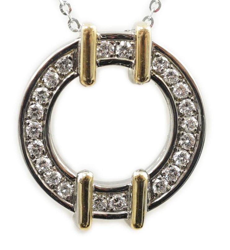 A modern two colour gold and diamond cluster set open work circular pendant, on an 18ct white gold chain